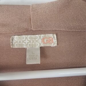 Womens NWT Rose Gold Bodysuit size Large Polyester Blend excellent Condition